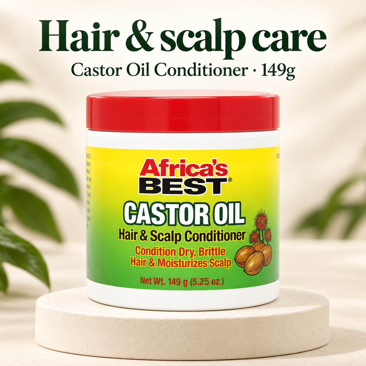 A white plastic jar of Africa's Best Castor Oil Hair & Scalp Conditioner with a red lid, displayed on a round beige pedestal with a soft-focus background of green leaves.