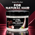 A 10 oz jar of Ampro Pro Styl Curl Enhancer Gel Activator on a reflective dark surface with a black and dark red graphic background. The product features a black lid and a black label with white text and a coconut/palm graphic.