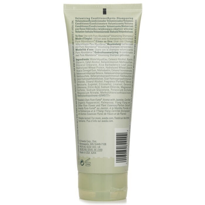 Back label of a green tube with text and a barcode on a white background