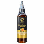 A bottle of Style London Black Castor Hair Oil with a black and gold label, set against a plain white background.