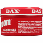 Red container of DAX hair dress with white text on a white background