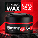 A black jar of Gummy Professional Styling Wax Ultra Hold with a red band, displayed on a dark textured surface with a red and black graphic background and a top text banner.