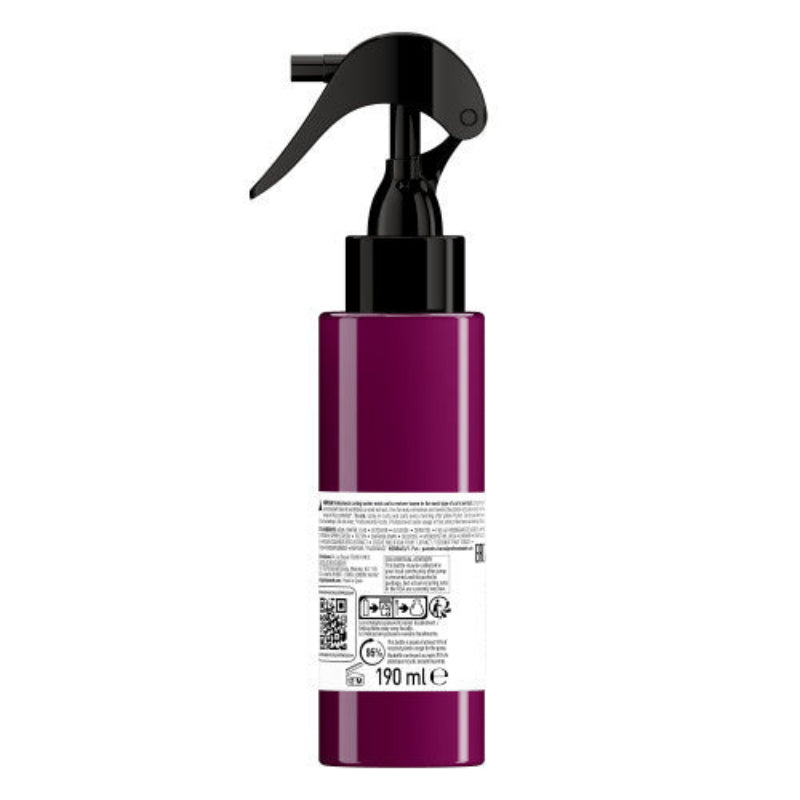 Purple spray bottle with black nozzle on a white background