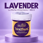A jar of La Riche Directions hair color in the lavender shade, displayed on a purple pedestal against a matching purple background. The product packaging features a yellow and dark purple label with a white lid.
