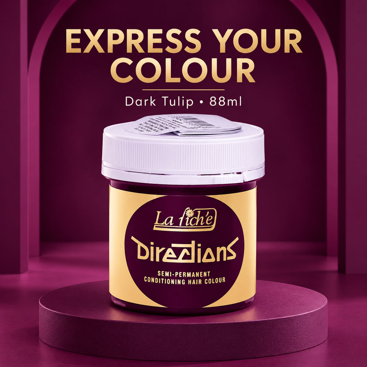 A jar of La Riche's Directions Dark Tulip semi-permanent conditioning hair colour, presented on a dark purple pedestal with promotional text in the background.