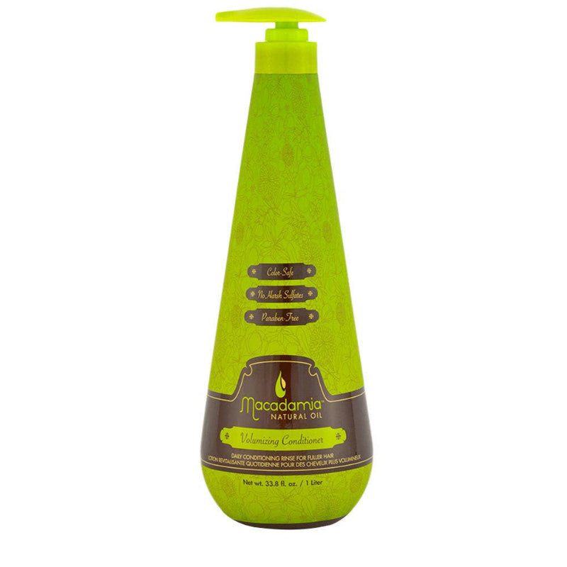 Green bottle of Macadamia Natural Oil hair conditioner on a white background
