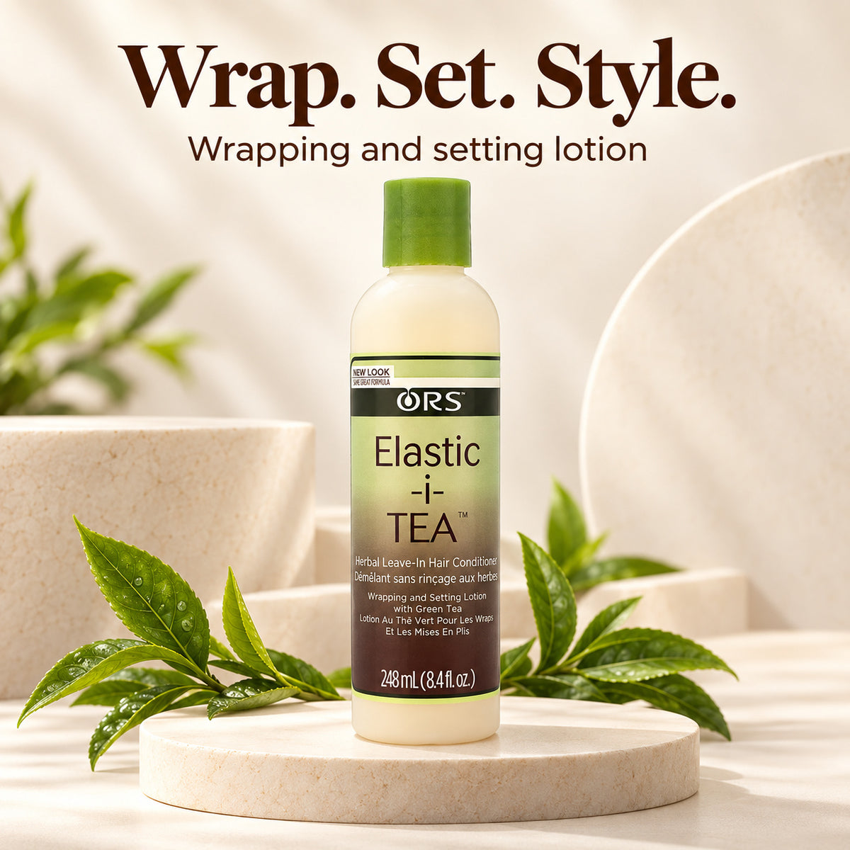 A bottle of ORS Elastic-i TEA Wrapping and Setting Lotion stands on a round stone pedestal with green tea leaves around it. Large text at the top reads 'Wrap.