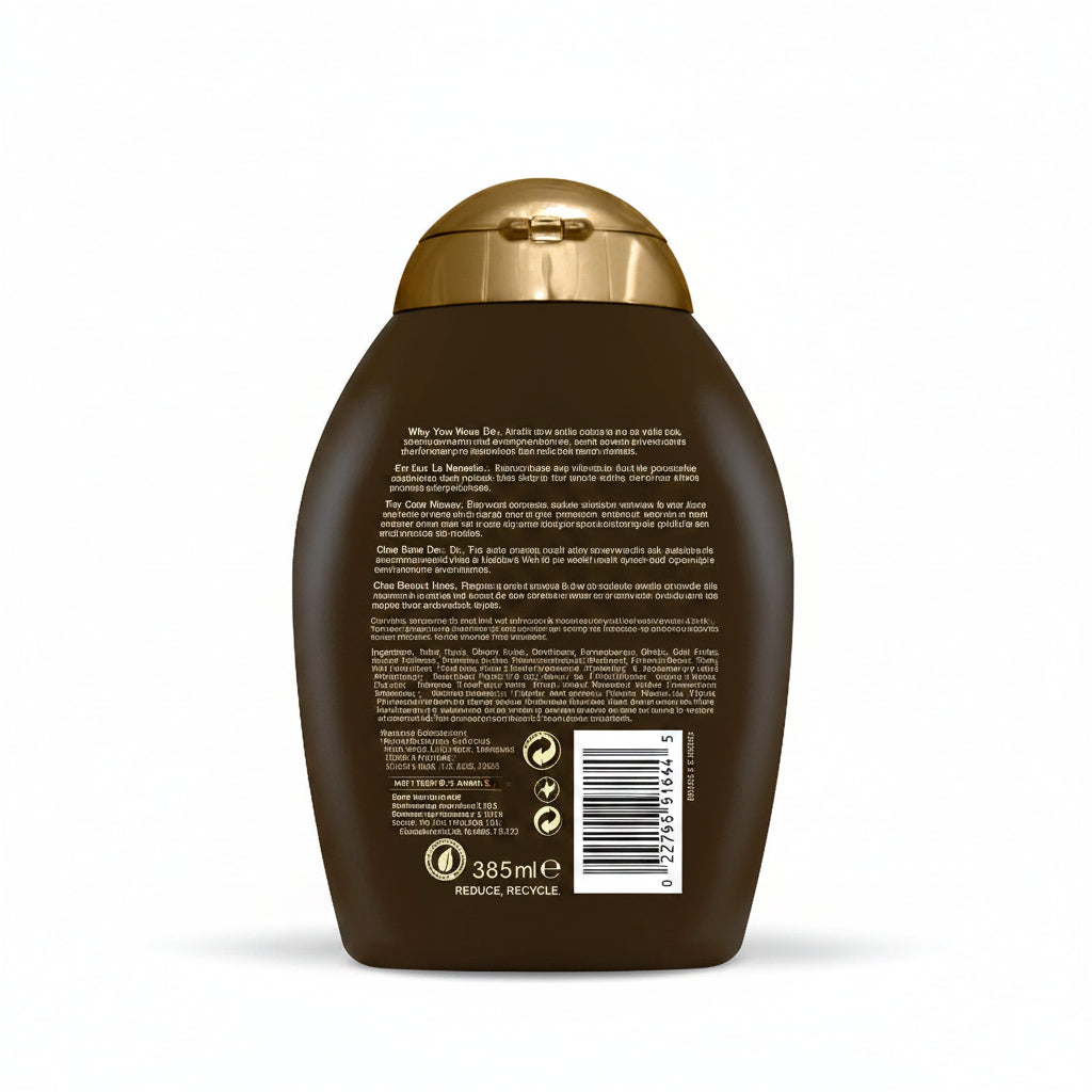 Back of a brown shampoo bottle with gold cap on a white background