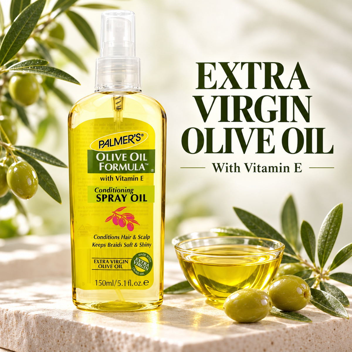 A bottle of Palmer's Olive Oil Formula Conditioning Spray Oil with Vitamin E, filled with golden yellow oil, displayed on a stone surface with green olives and a small glass bowl of oil. The background is a soft-focus olive grove with text reading 'EXTRA VIRGIN OLIVE OIL With Vitamin E'.