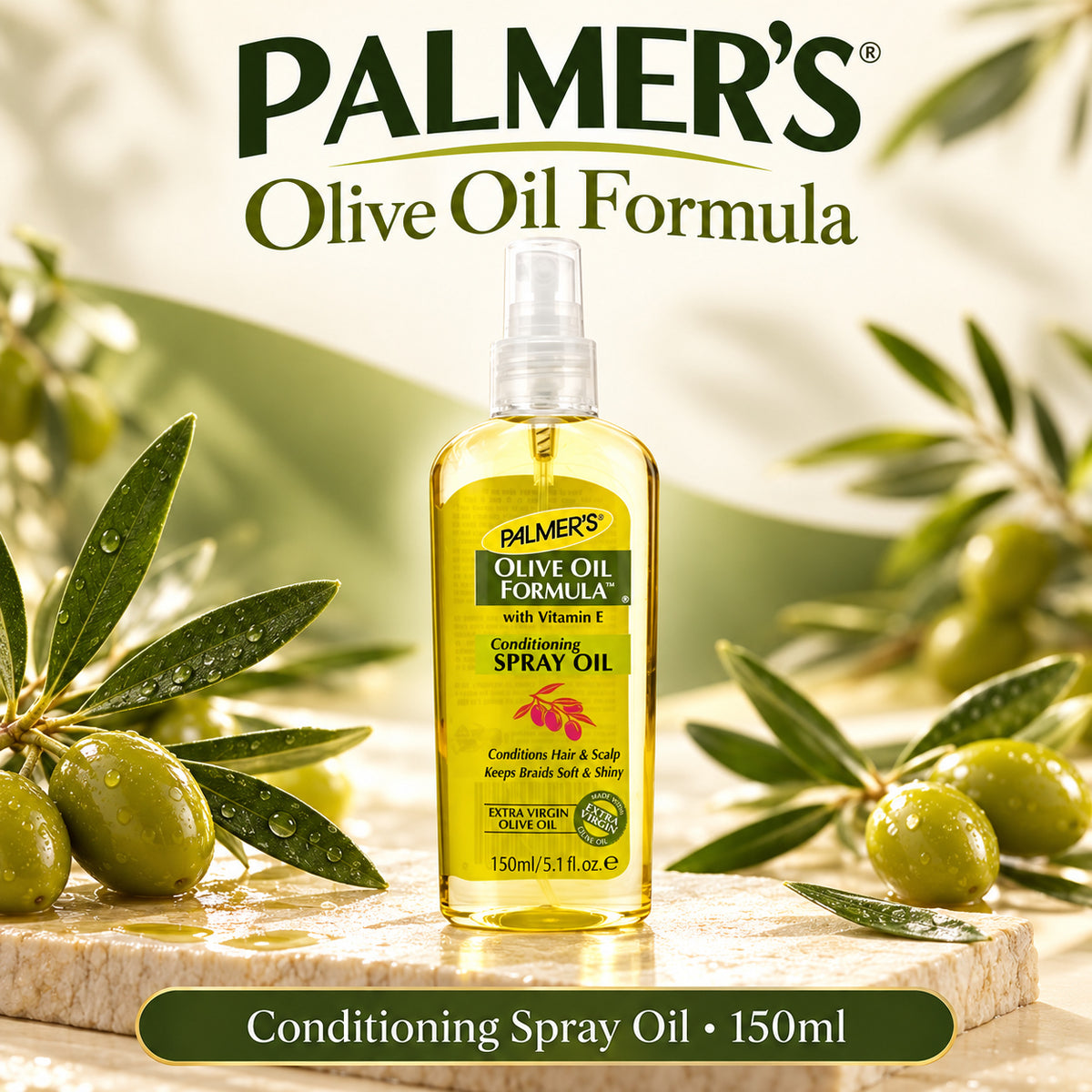 A bottle of Palmer's Olive Oil Formula Conditioning Spray Oil, 150ml, displayed on a stone slab with fresh olives and olive branches in a warm, natural setting.
