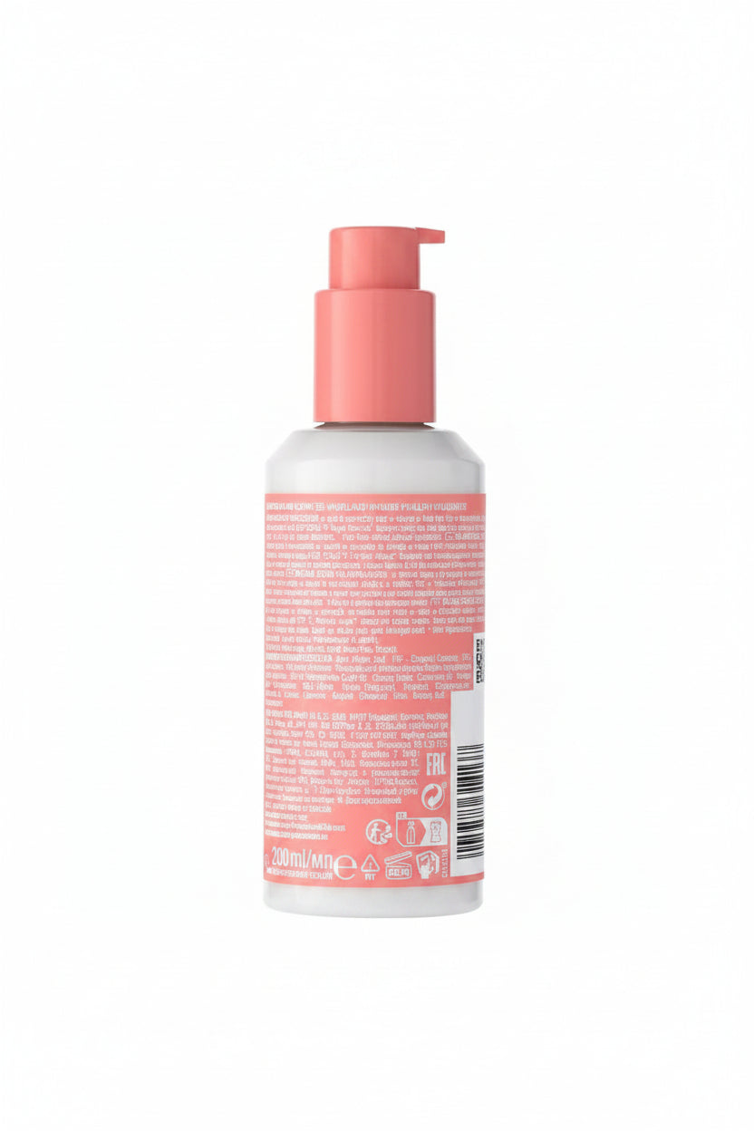 Bottle with pink pump and label on a white background