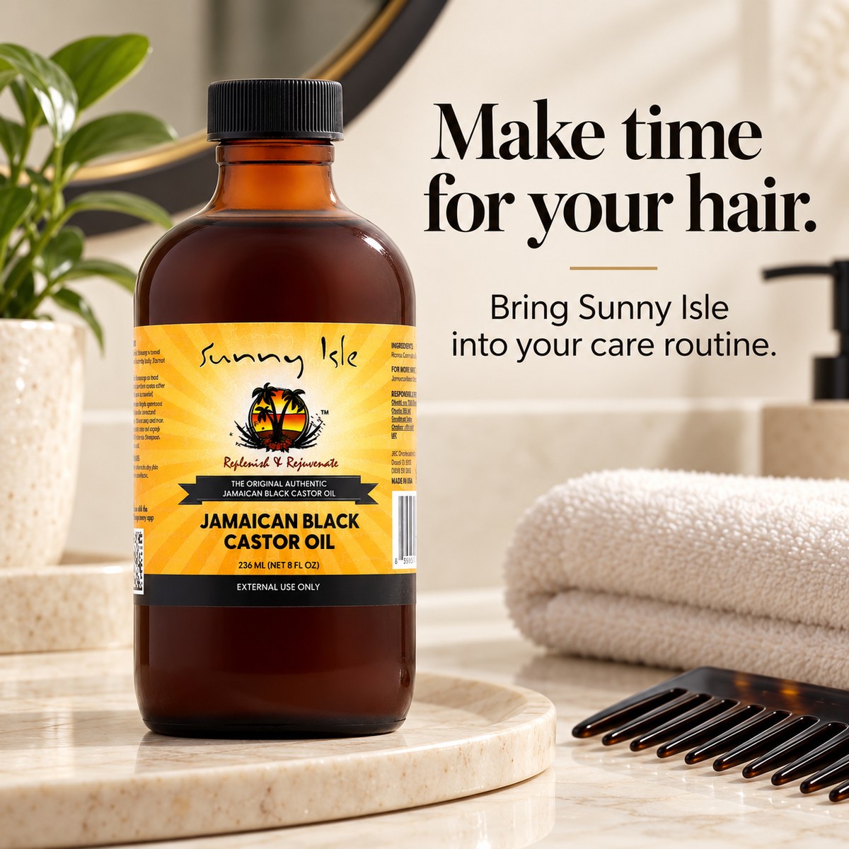 A bottle of Sunny Isle Jamaican Black Castor Oil stands on a marble tray in a bathroom setting, with a folded towel, hair comb, and decorative plant in the background. Text on the image reads, 'Make time for your hair.