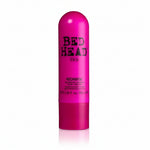 Pink bottle of TIGI Bed Head Recharge hair product on a white background