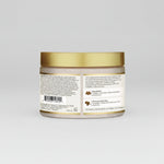 Jar of hair product with gold lid and label on a white background
