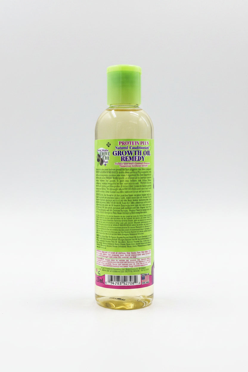 Bottle of 'Protein Plus' natural conditioning growth oil remedy with a green label on a white background.