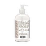 White bottle with pump and label on a white background