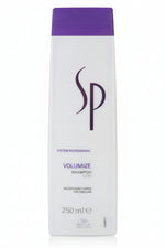 Shampoo bottle with purple cap and white label on a white background